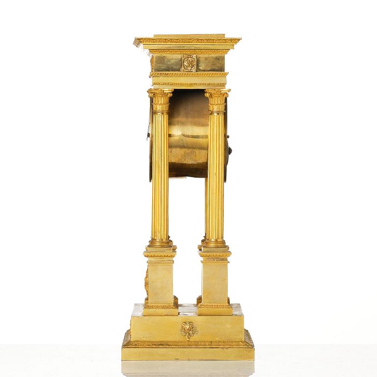An Empire ormolu portico clock by Louis Bausse (watchmaker in Paris ca. 1807-24).