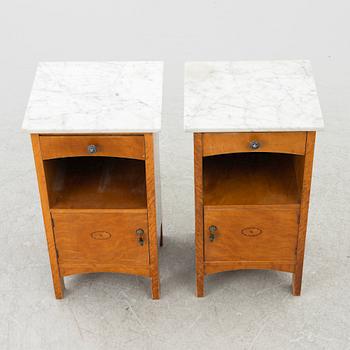 A pair of early 20th century bedside tables.
