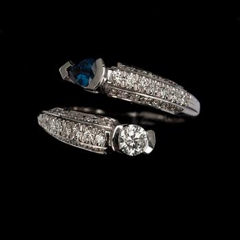 RING, vitguld 18K, briljantslipad diamant 0,23 ct, 42 st. små diamanter, safir 0,20 ct. Vikt 5,8 g.