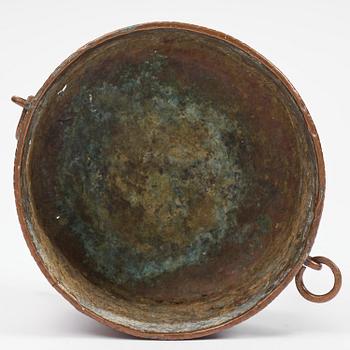 A Swedish baroque repousse copper cauldron, early 18th century.