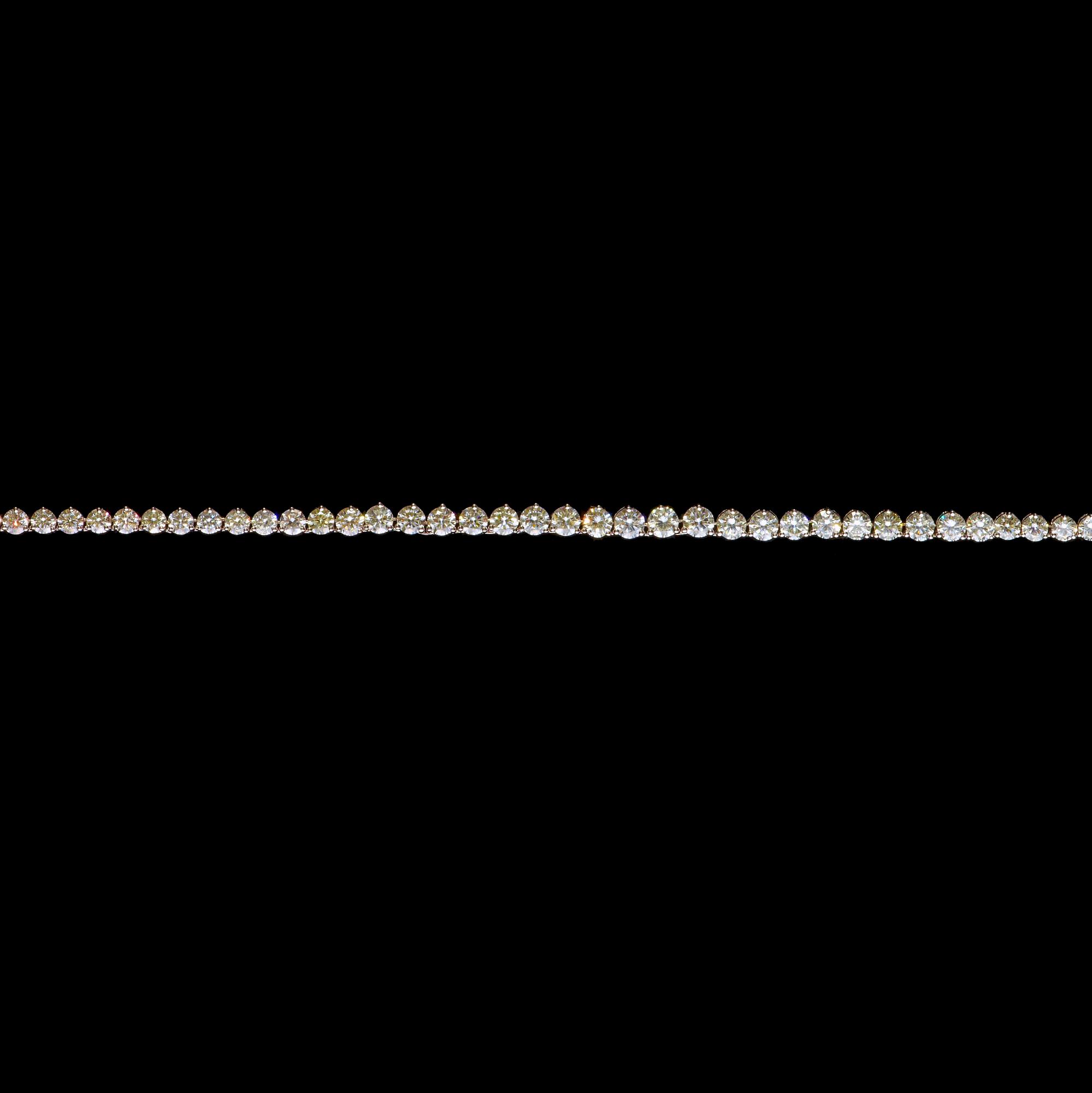 A brilliant cut diamond necklace, tot. 14.70 ct.