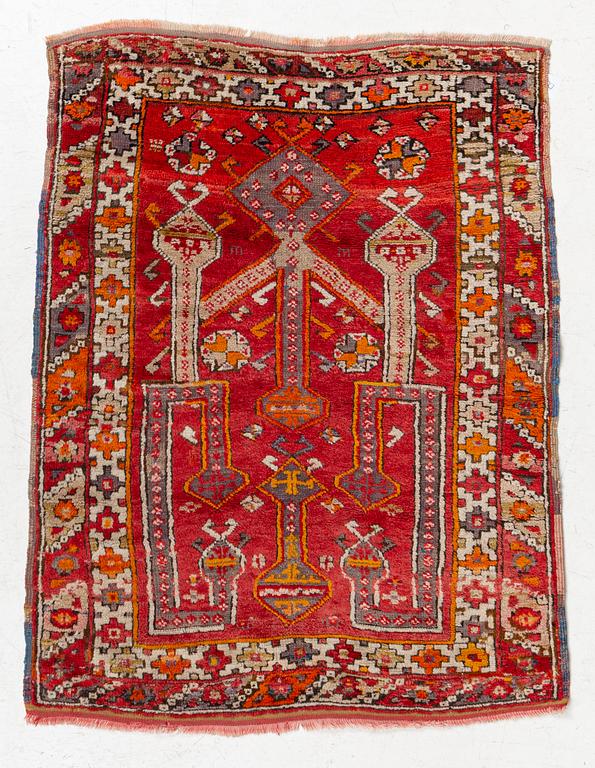 A semi-antique Anatolian rug, possibly Konya, approximately 152 x 117 cm.