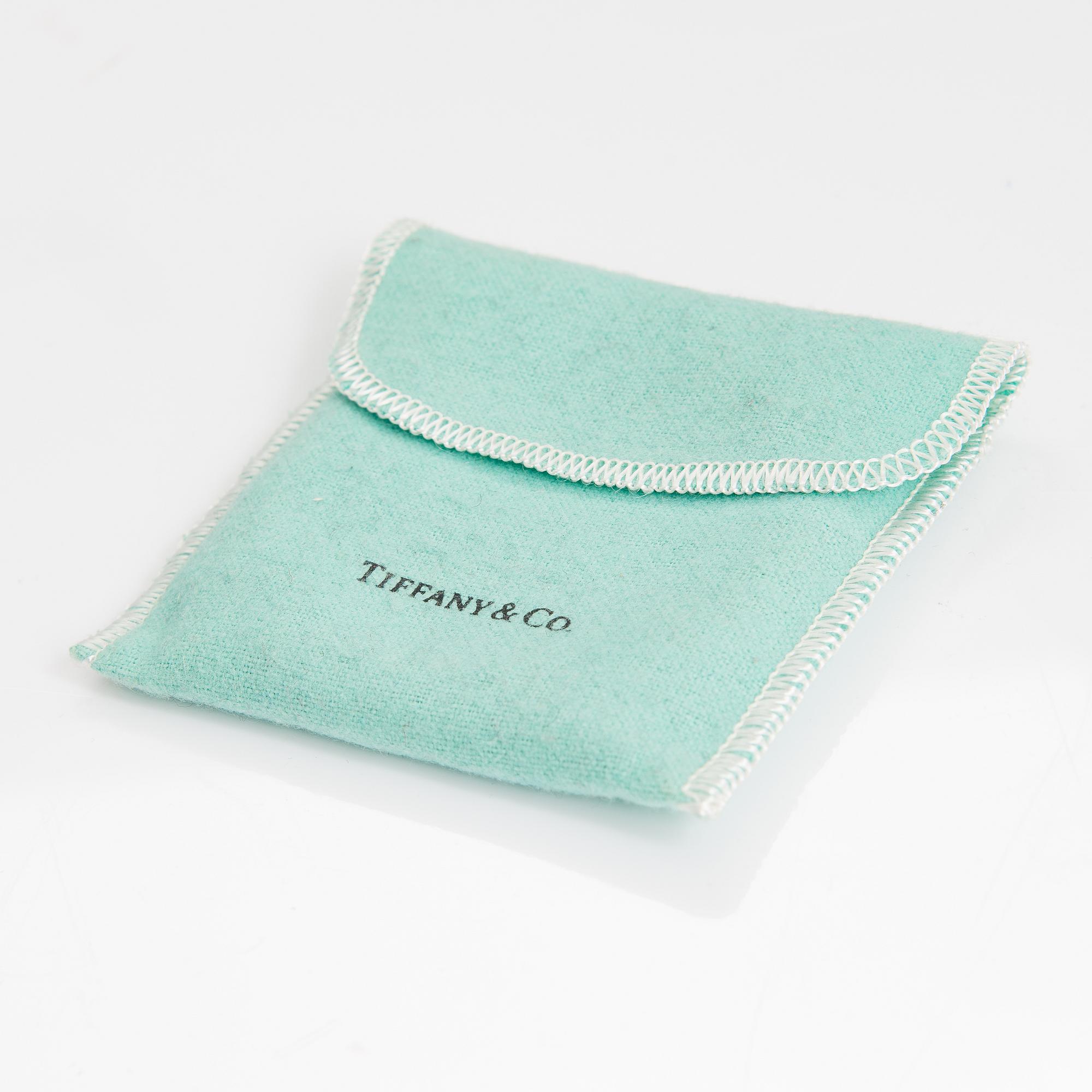 TIFFANY & CO, A sterling siler bangle.