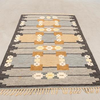 Flat-weave rug signed GS, approximately 233x165 cm.