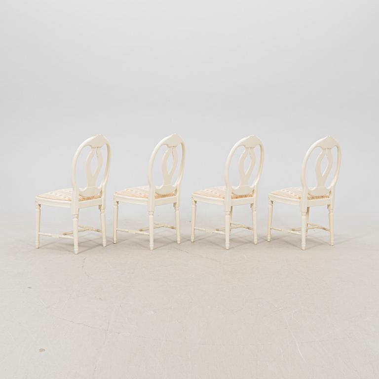 A late 20th century painted Gustavian style 5 pcs dining suit.