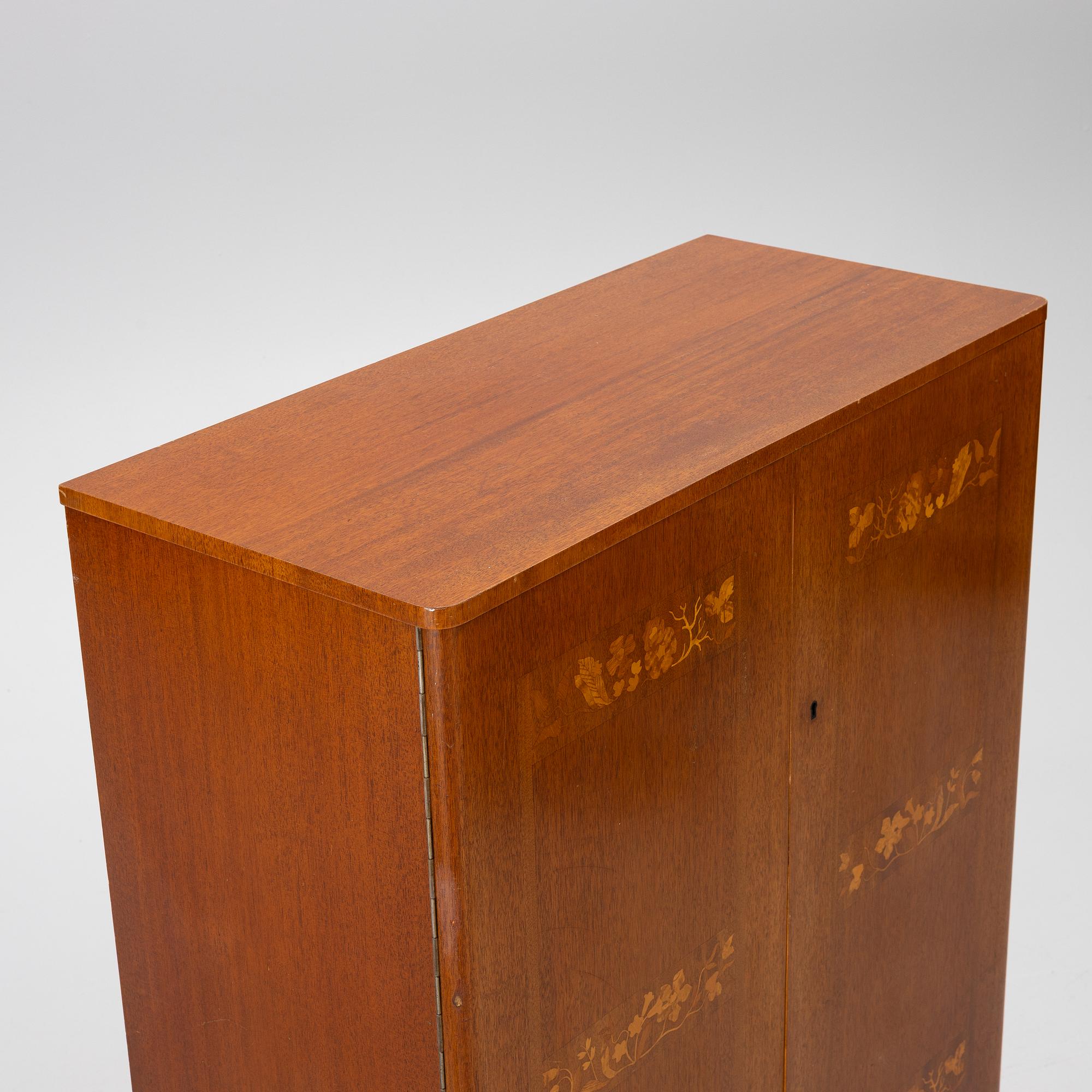 A Swedish Modern cabinet, 1940s.