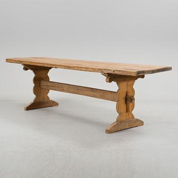 A 20th century pine table.