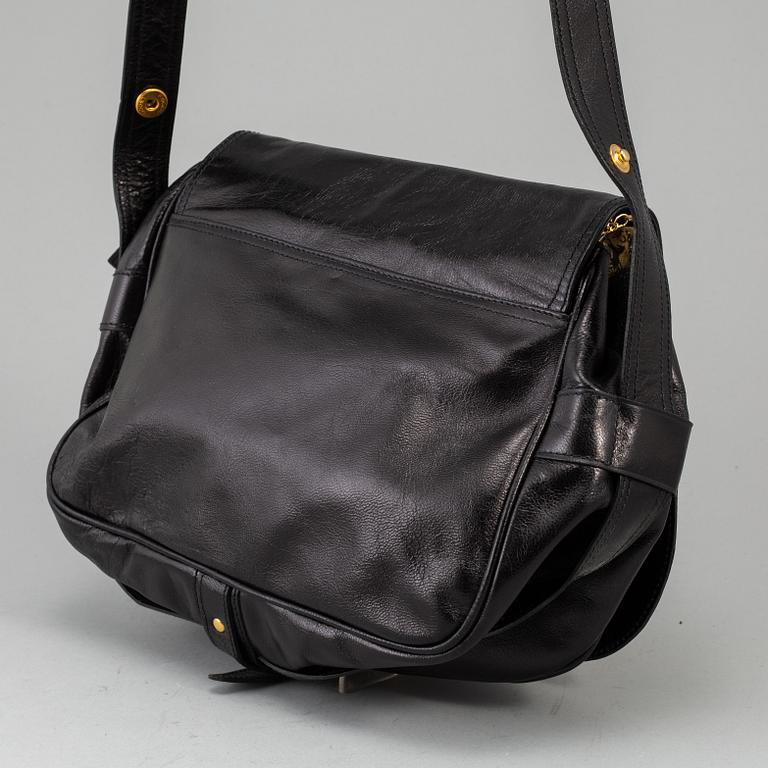 CÉLINE,a black leather handbag.