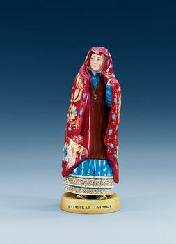 1337. A Russian bisquit figure of a Tatar lady from Kazan, Gardner manufactory, second half of 19th Century.