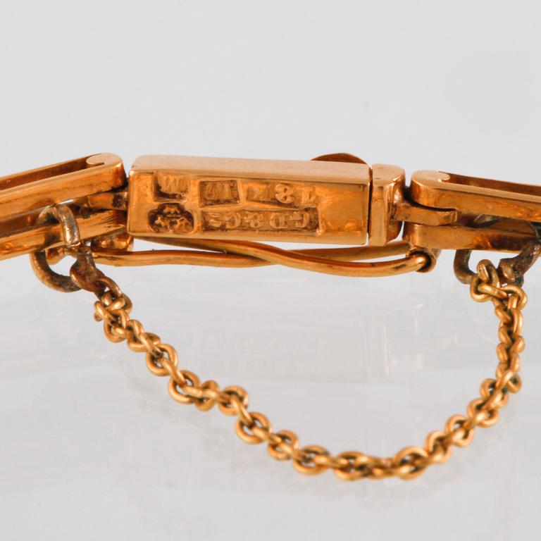 ARMBAND, 18K guld, Gustav Dahlgren & Co, Malmö, 1913. Vikt 6,4 gram.