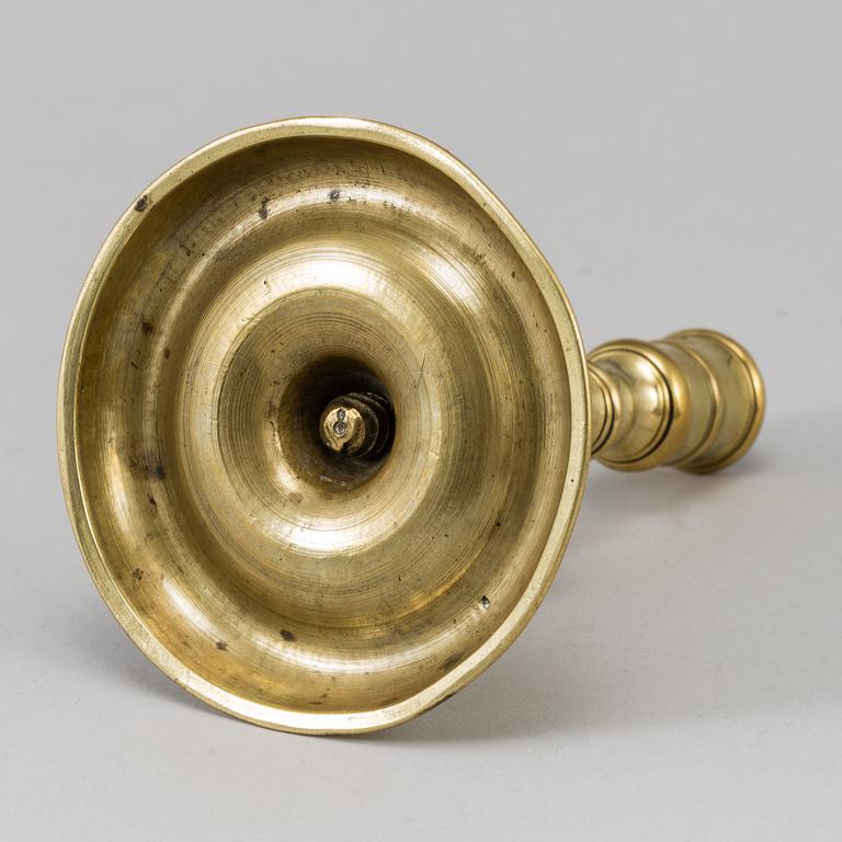 A bronze candlestick, 17th/18th century.