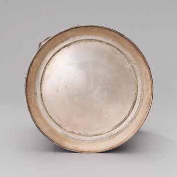 A Louis Roederer champagne cooler of silver plated brass.