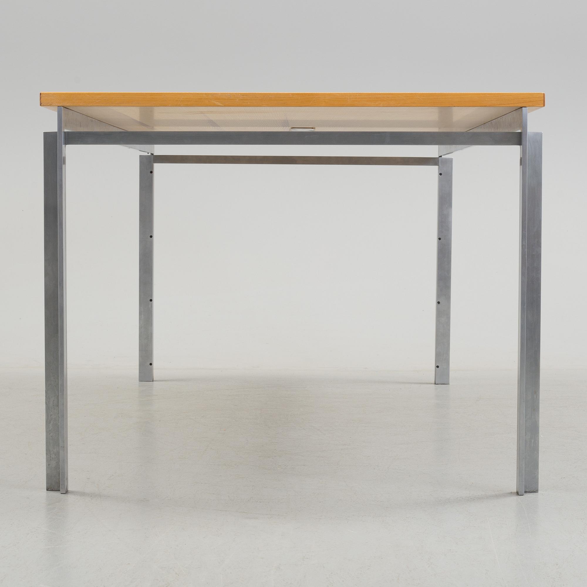 A Poul Kjaerholm "PK-55" table from Fritz Hansen, Denmark.