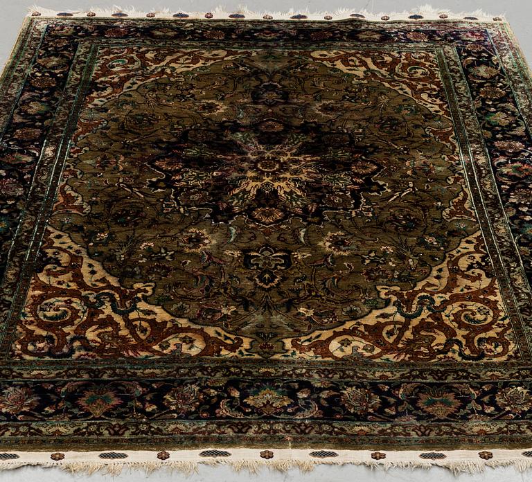 A RUG, Old oriental silk, around 195 x 143 cm.