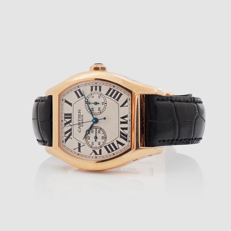 A Cartier, Tortue XL Monopusher. Manual winding. Case and clasp in 18K gold. Ref no: W1547451. Serial no: 186.