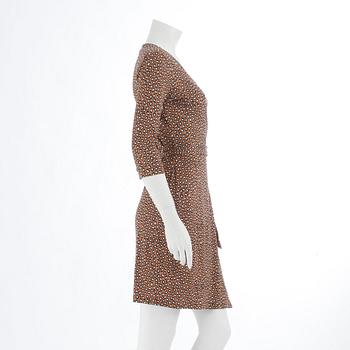 DIANE VON FÜRSTENBERG, a leopard print cotton wrap dress.