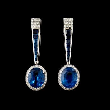 169. A pair of sapphire and diamond earrings. Sapphire total carat weight 5.63 cts, diamond total carat weight 0.62 ct.