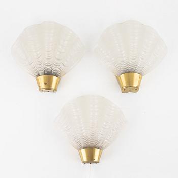 A set of three wall lamps, "coquille", ASEA lighting 1940s.