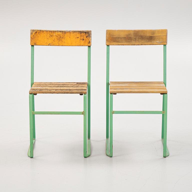 A pair of garden chairs, a version of modell 6, Grythyttan, Sweden, mid 20th century.