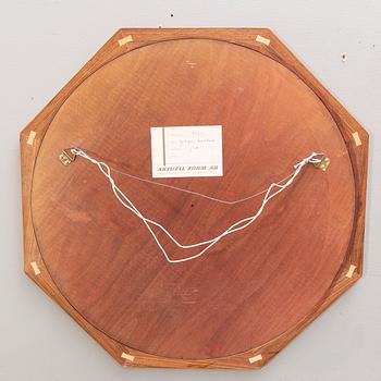 A Sigvard Bernadotte jacaranda mirror for Aktuell Form later part of the 20th century.