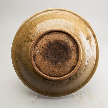 A celadon ge glazed dish, South East Asia, presumably Sawankhalok, 15th/17th Centuyr.