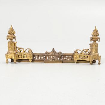 Pair of candelabra and a firedog, 18th/19th century.
