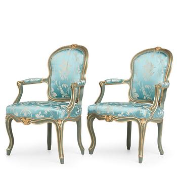 66. Two Louis XV mid 18th century armchairs.