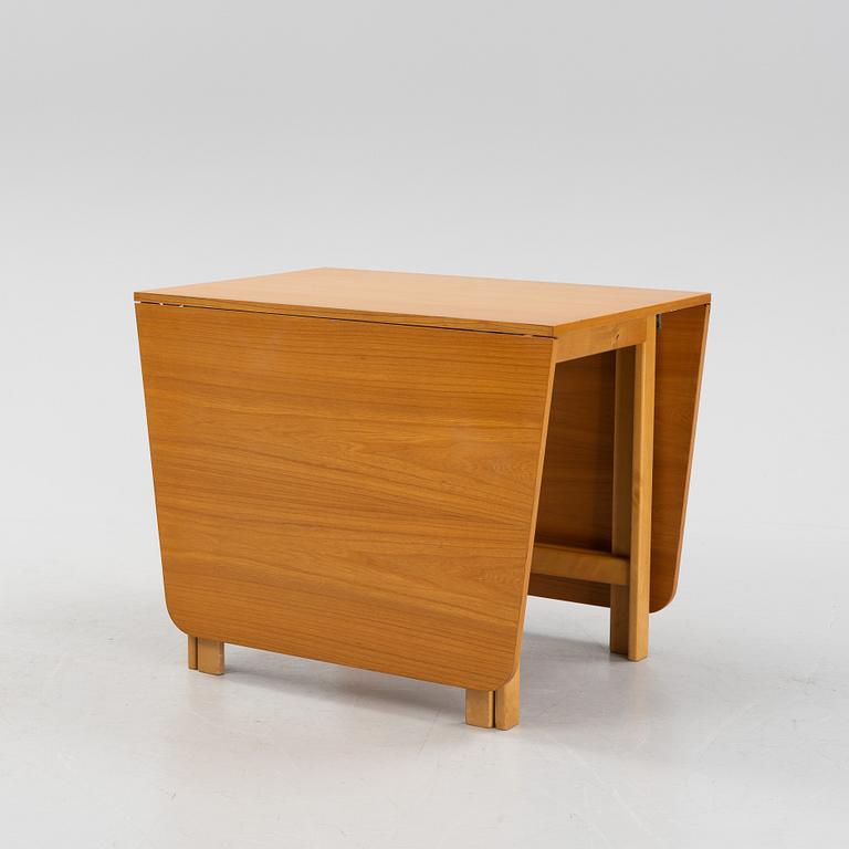 A gate-legged table by Nordiska Kompaniet 1956.