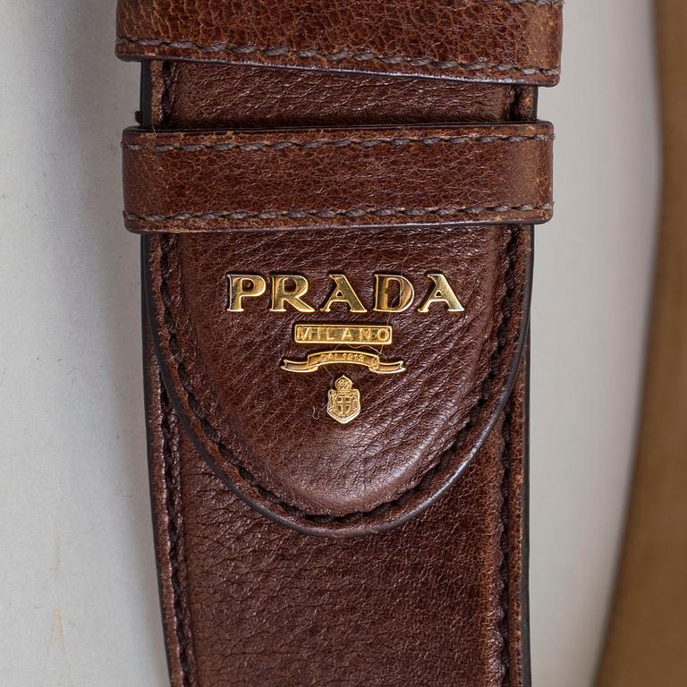 PRADA, a leather belt, size 75/30.