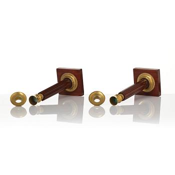 A pair of late Gustavian mahogany and gilt-brass candlesticks, late 18th century.