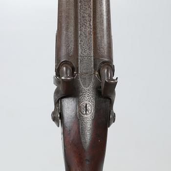 A percussion rifle by Charles William Lanchester in London, around the mid 19th century.