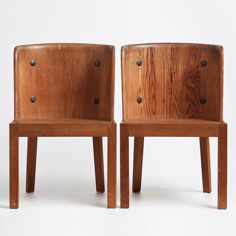 Axel Einar Hjorth, a pair of stained pine "Lovö" chairs, Nordiska Kompaniet, 1930's.