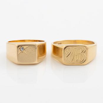 Two rings 18K gold.
