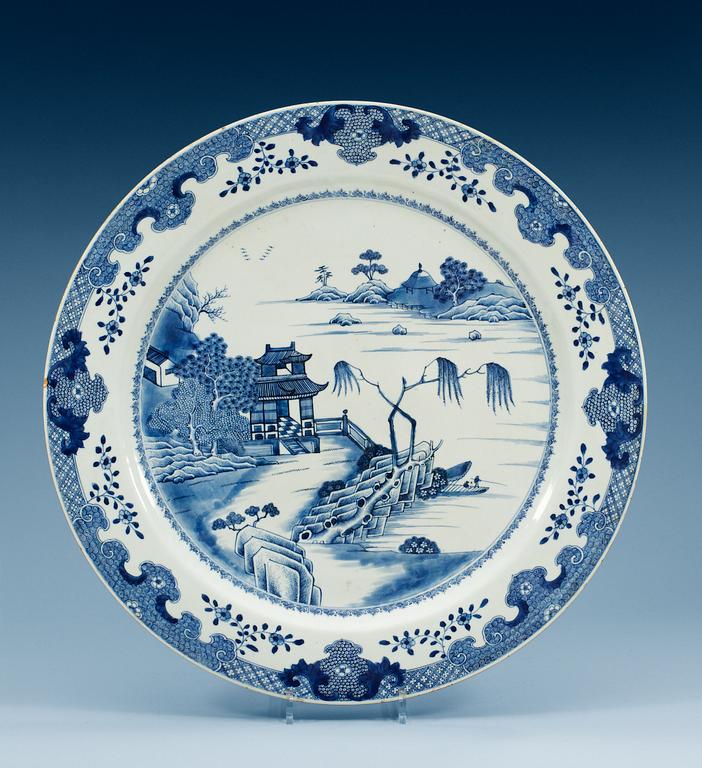A massive blue and white dish, Qing dynasty, Qianlong (1736-95).