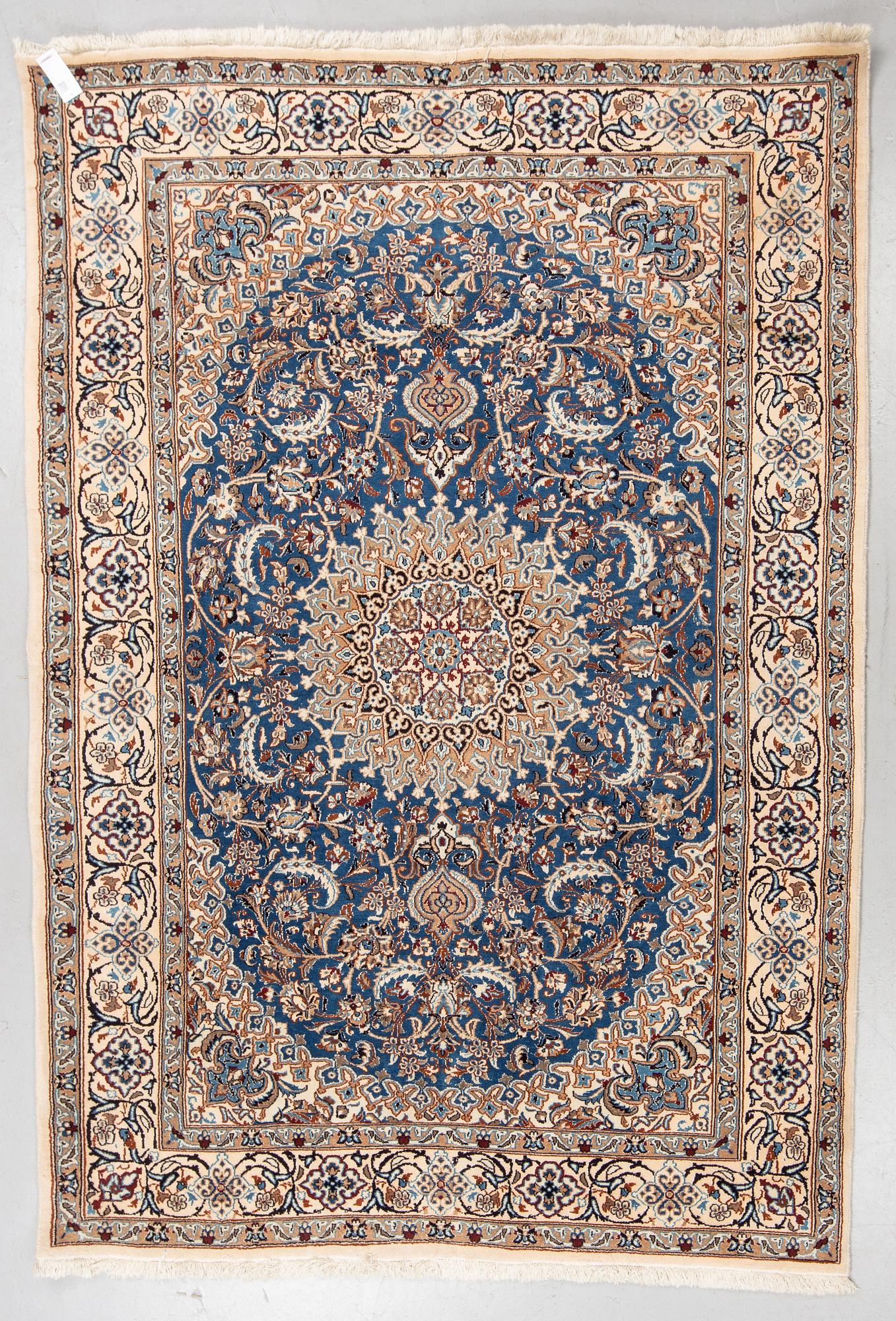 A carpet, Old Nain, part silk, ca 285 x 198 cm.