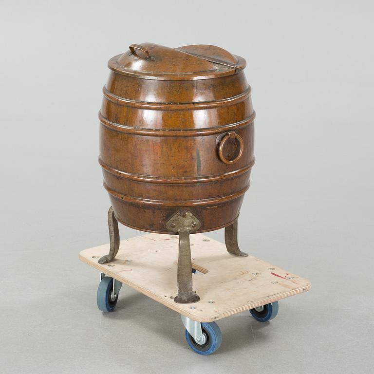 A copper water container, around the year 1900.