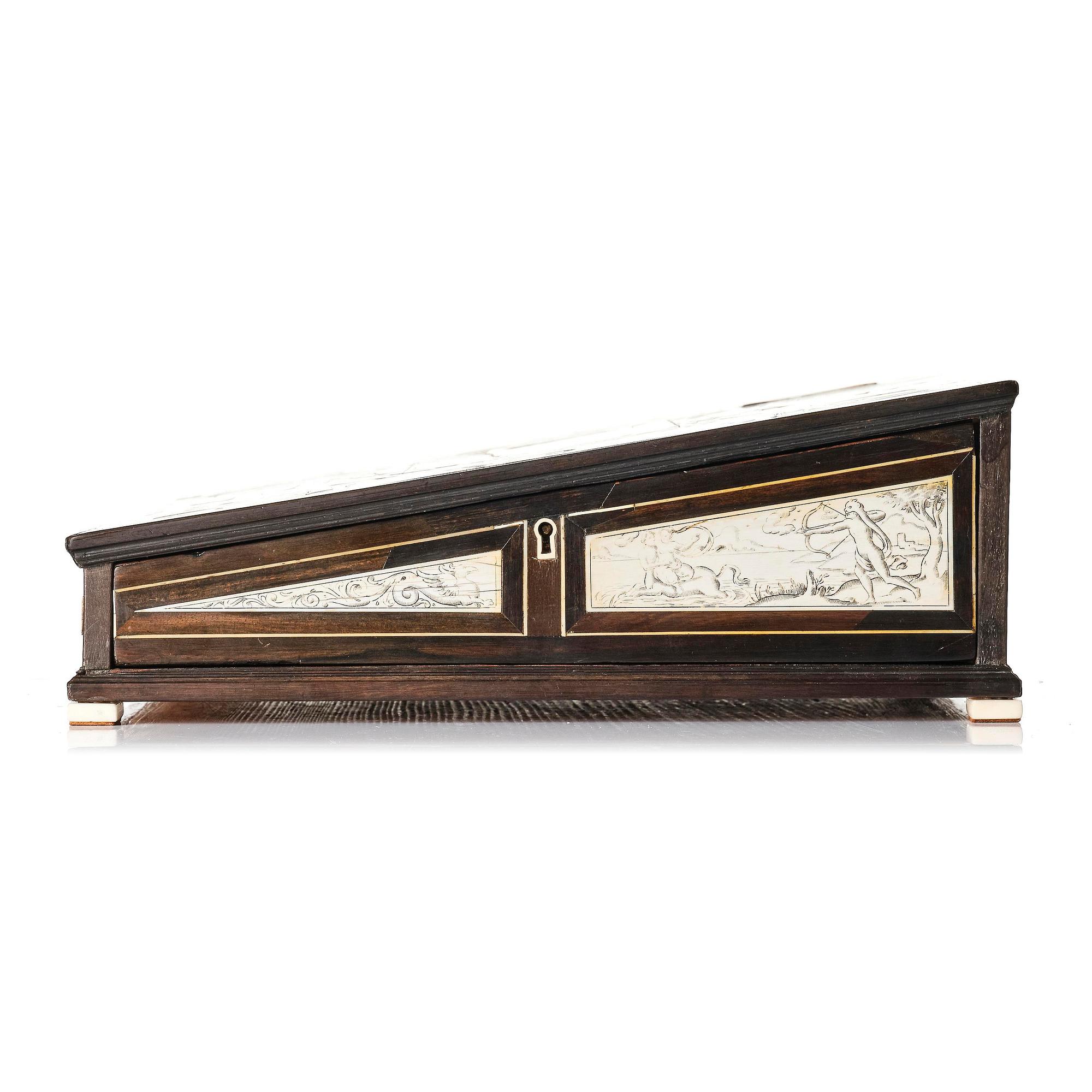 A Neopolitan ebony, rosewood and engraved ivory writing box from the circle of Iacopo Fiamengo, first part 17th century.