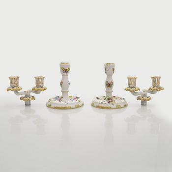A pair of Herend porcelain candlesticks, and a lidded sugar bowl, Hungary.