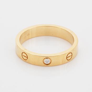 Cartier ring "Love" 18K guld med en rund briljantslipad diamant.