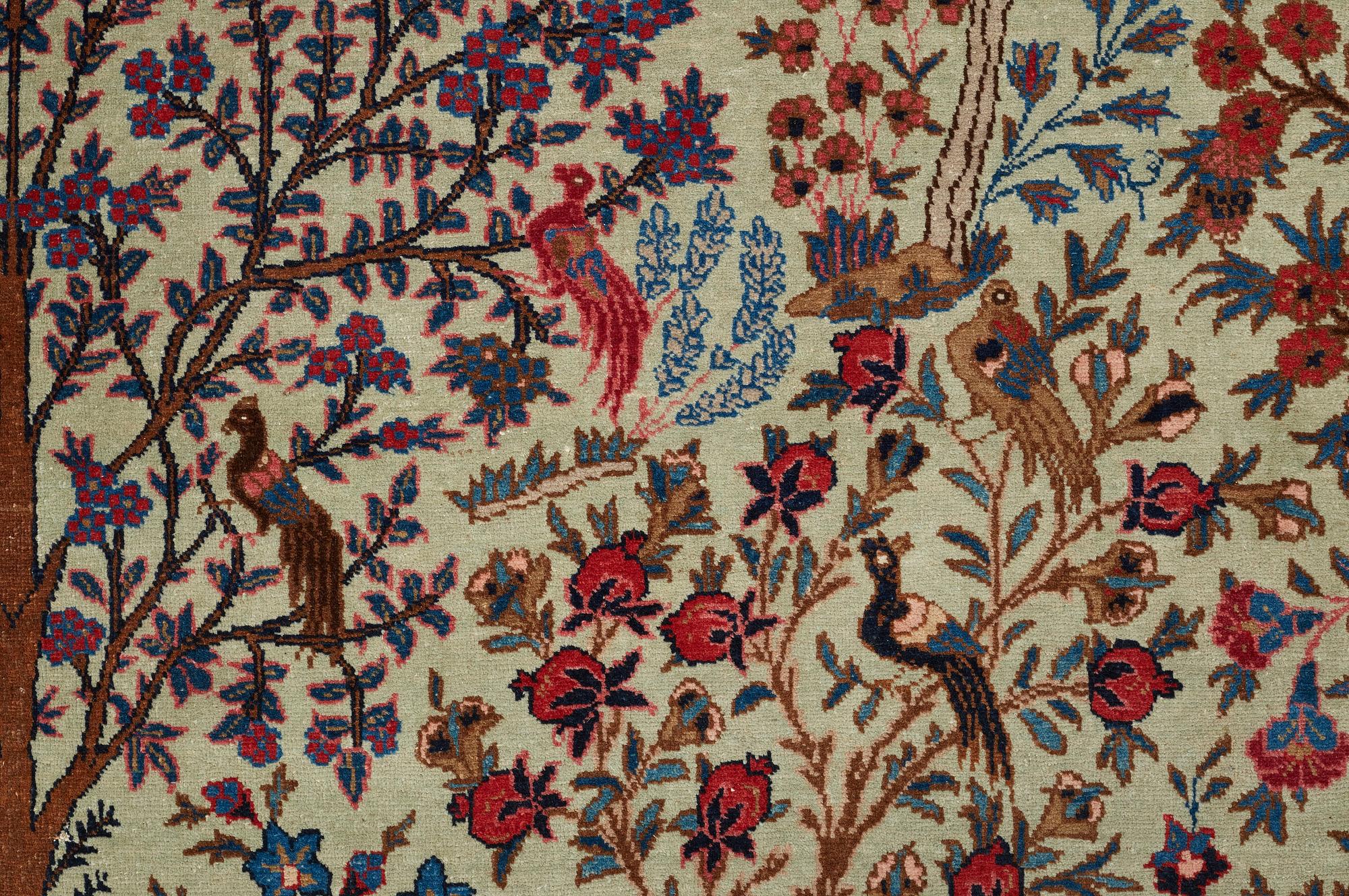A CARPET, a semi-antique Tabriz probably, ca 393 x 284 cm.