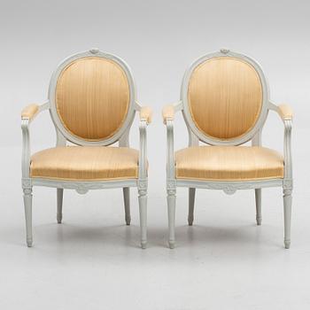 A pair of Gustavian style armchairs, 20th Century.