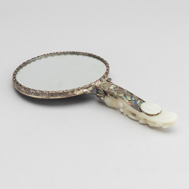 A Chinese silver mirror with carved nephrite placque and belt hook, early 20th Century.