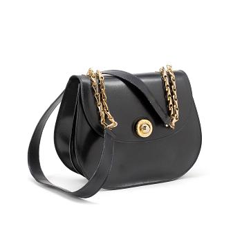 697. CÈLINE,  a navyblue leather handbag.