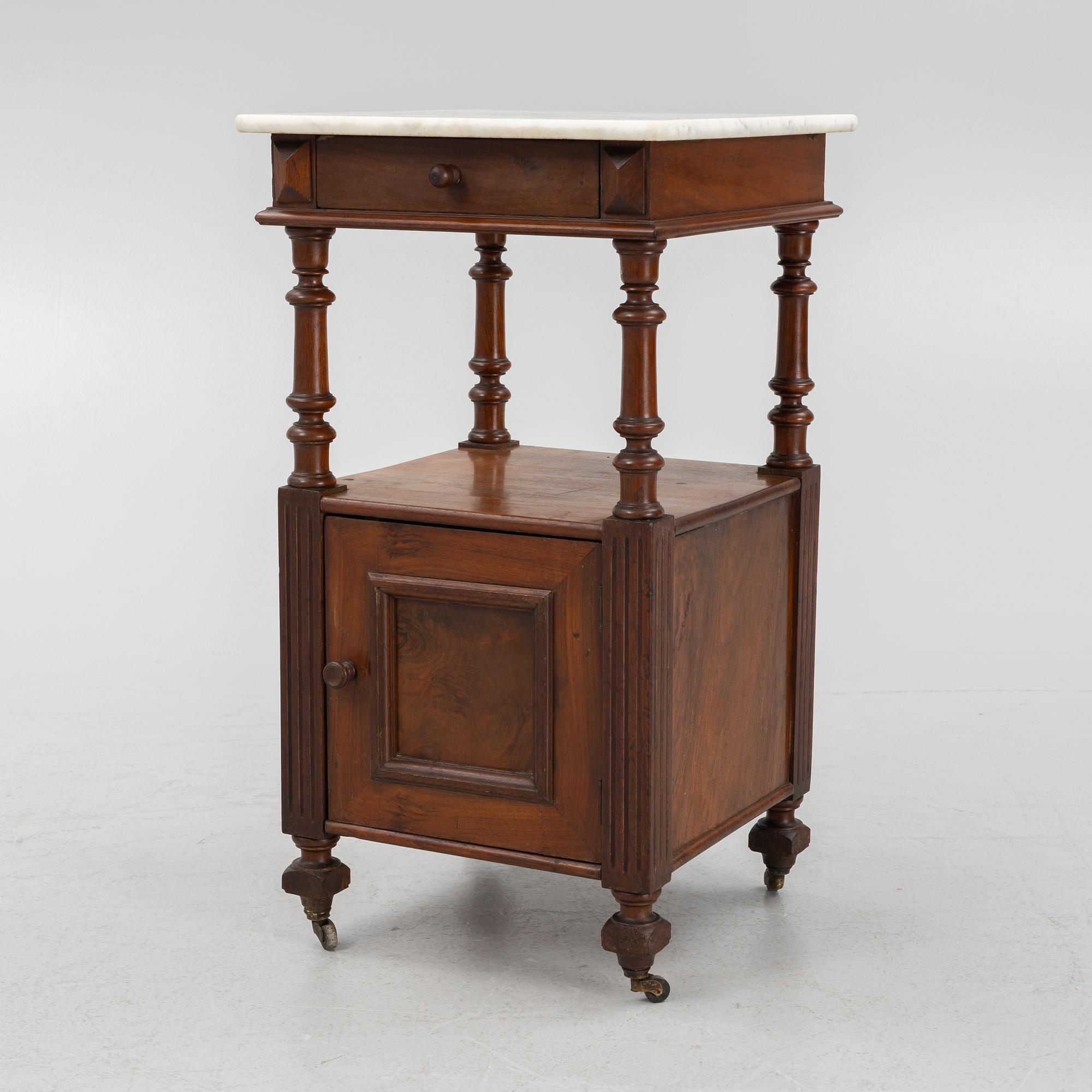 An early 20th century bedside table.