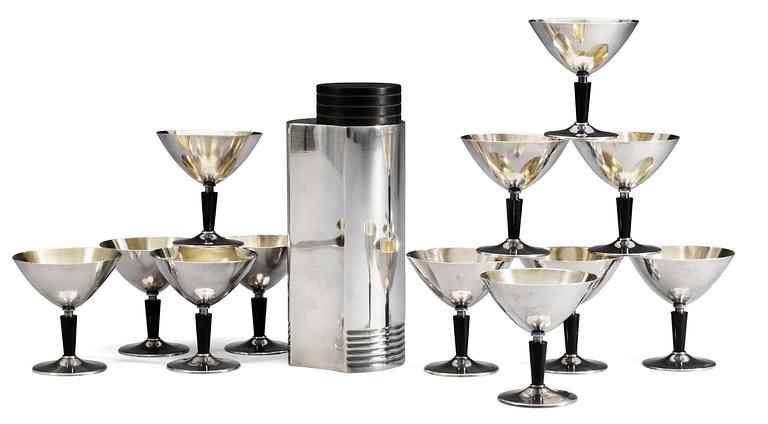 A GAB silver-plated and bakelite cocktail-shaker with eleven glass, design by Folke Arström.