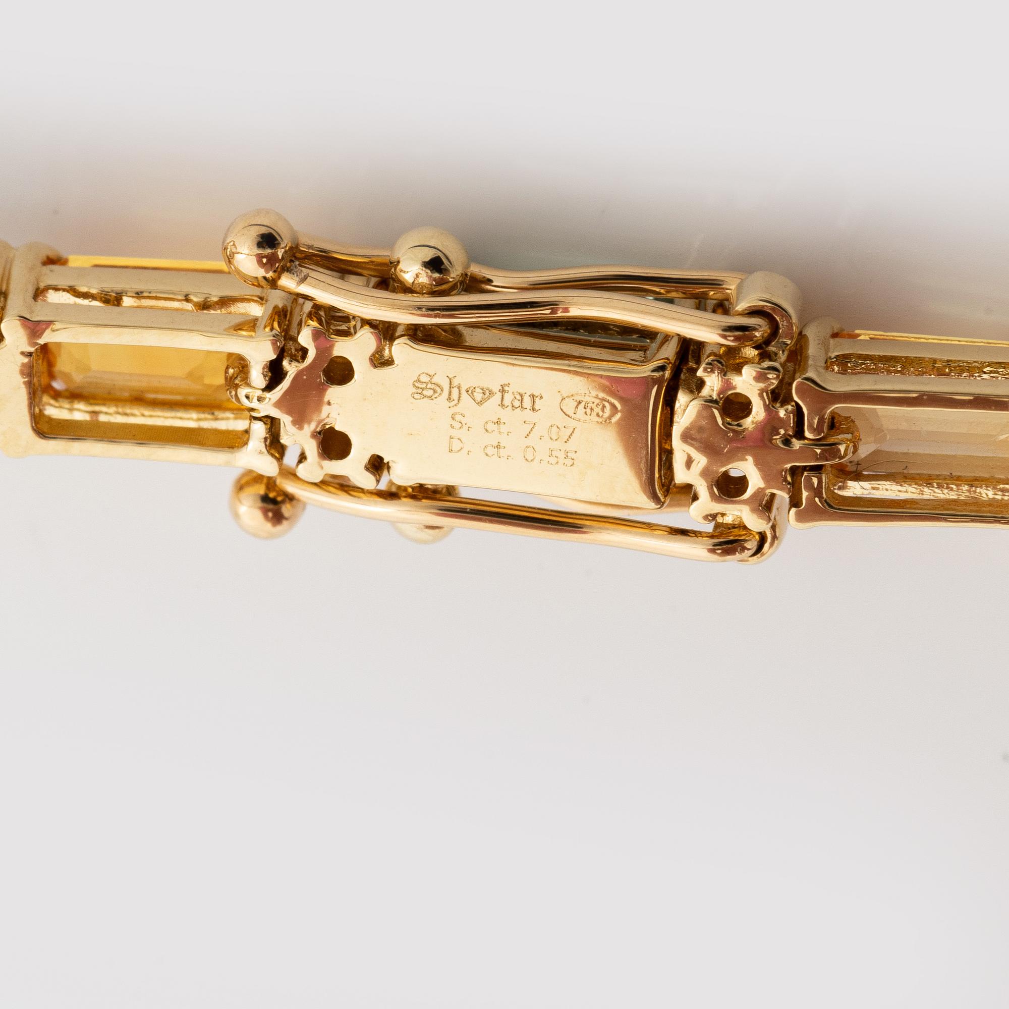 Bracelet 18K gold with multi-coloured sapphires and round brilliant-cut diamonds.