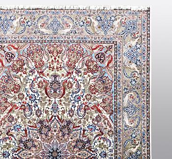 A carpet, Old Esfahan, part silk, ca 308 x 202 cm.