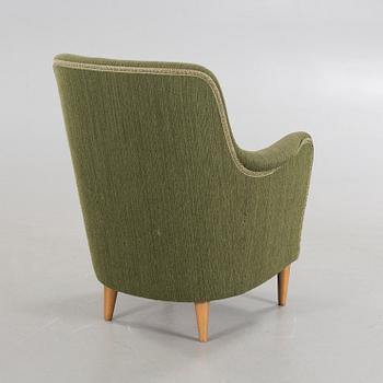 A "Samsas" armchair by Carl Malmsten.