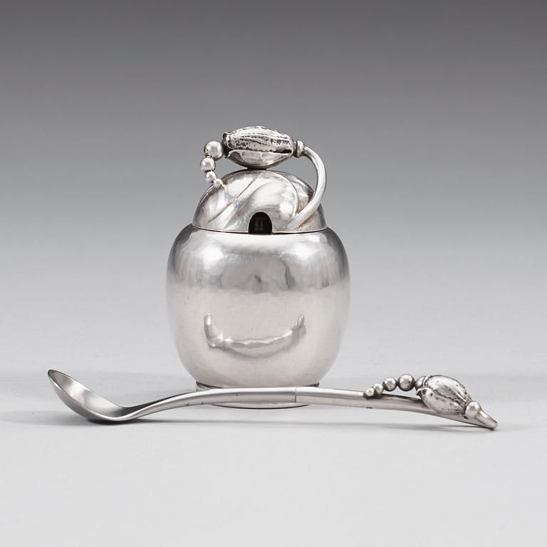 A Georg Jensen 'Blossom' sterling mustard jar with spoon, Copenhagen 1933-44.