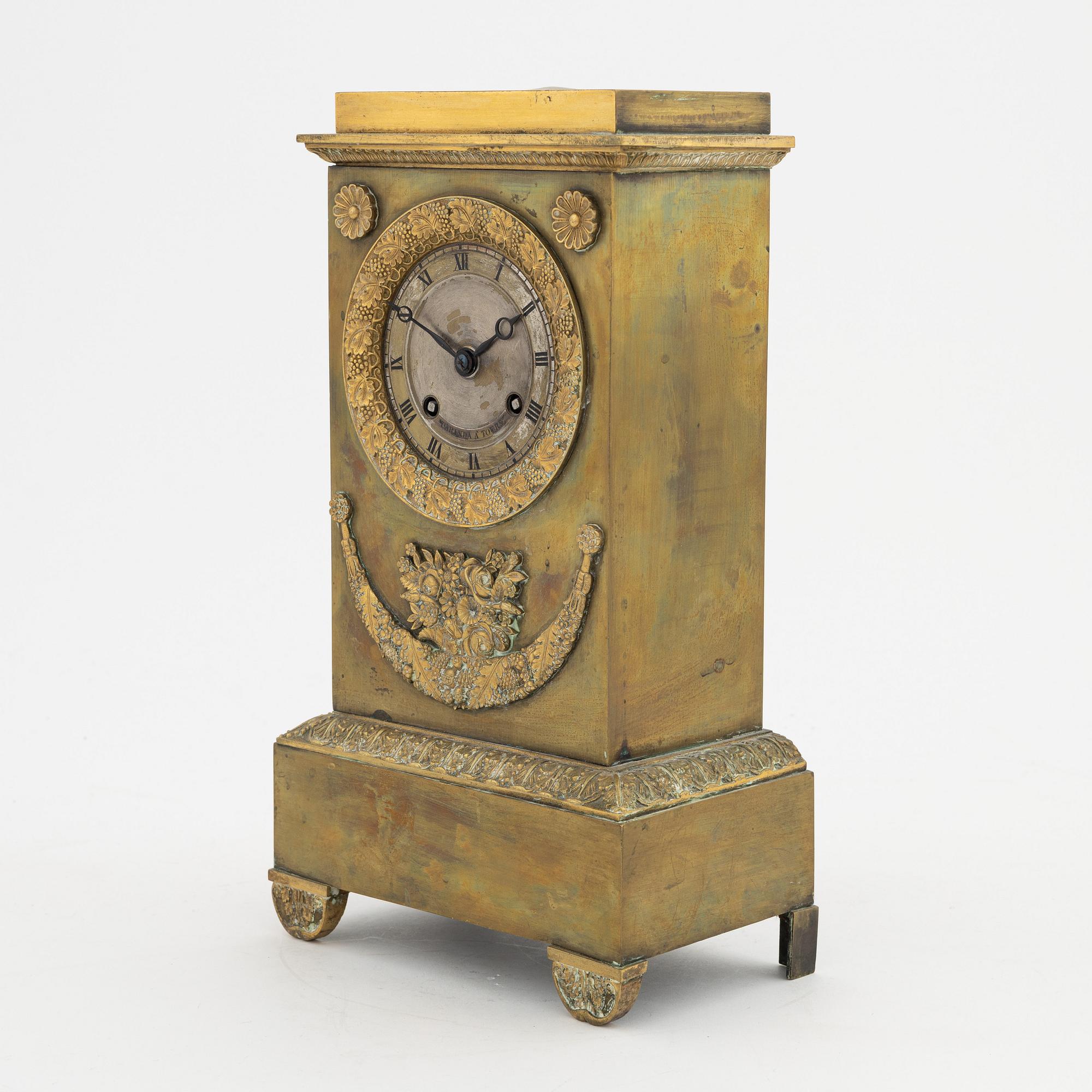 An Empire mantle clock, mid 19th century.
